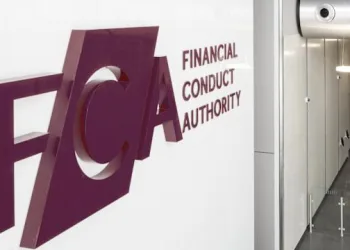 A wall with a large maroon Financial Conduct Authority (FCA) logo and text, next to a modern hallway with white walls and ceiling lights.