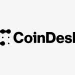 The CoinDesk logo features a black geometric design resembling a letter C made of dots, followed by the bold black text CoinDesk on a light gray background—an emblem familiar to anyone following senate crypto bill coverage.