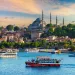 Istanbul's famous Suleymaniye mosque in background with boats on the Bosphorous in the foreground, used to illustrate an article about Turkey's crypto adoption.